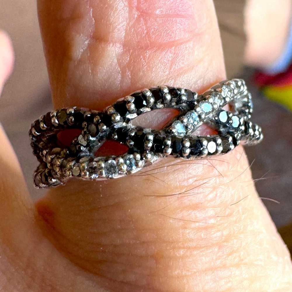 Used sterling and plat ring with diamonds